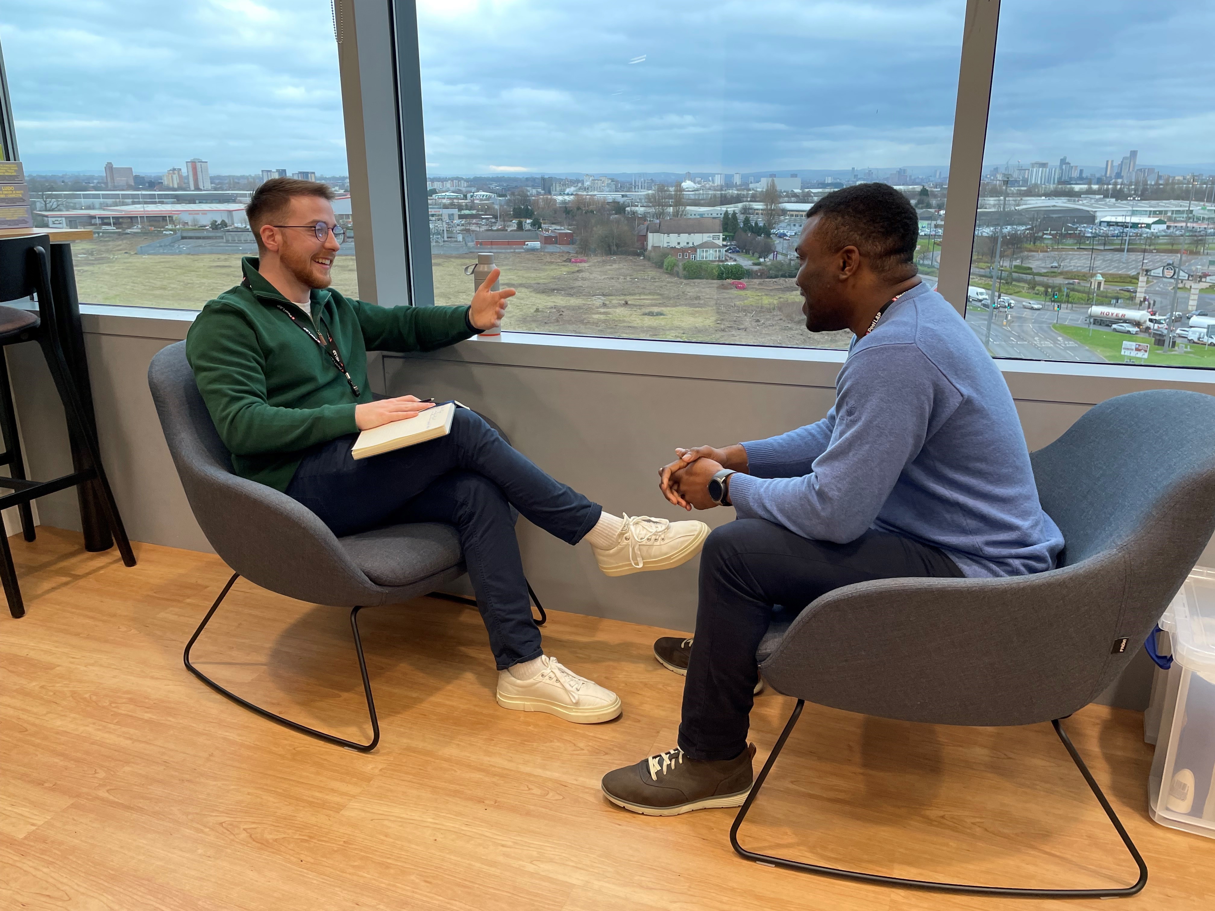 Andy and Tomi talking